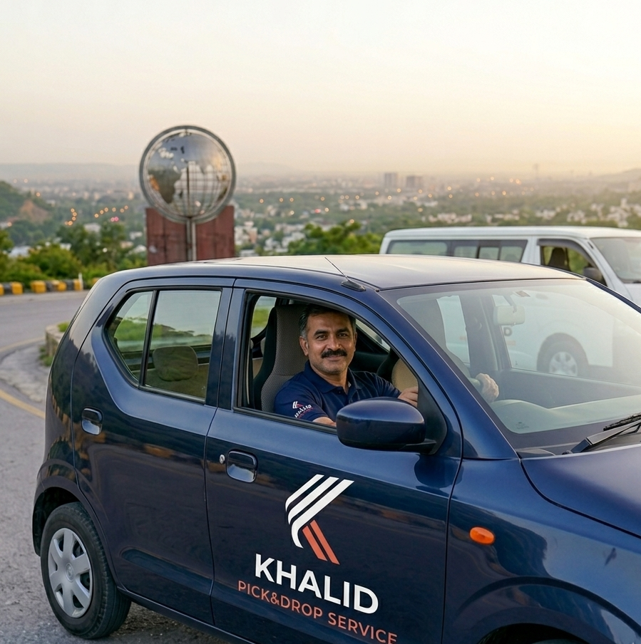 A dark blue Suzuki Alto hatchback, with detailed 'KHALID PICK&DROP SERVICE' branding on the side